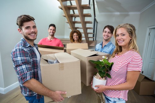 Removal team helping with a house move in Woking
