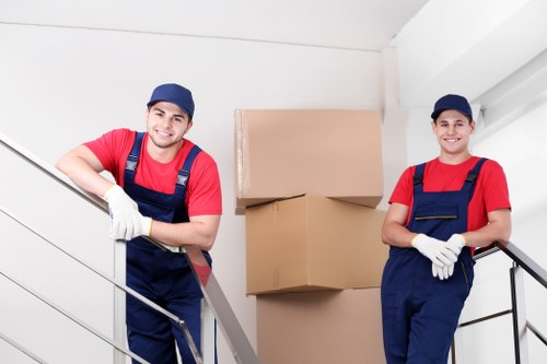 Removal van and moving boxes for a house move in Woking