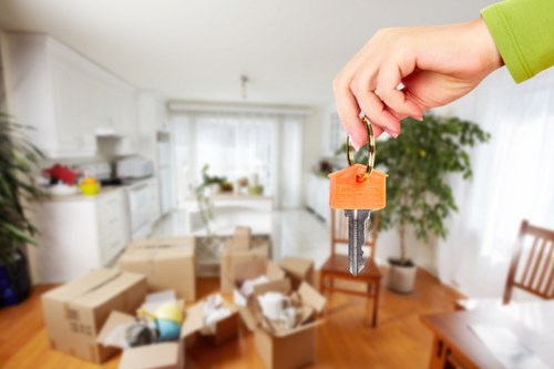 Removal van and moving boxes for a house move in Woking