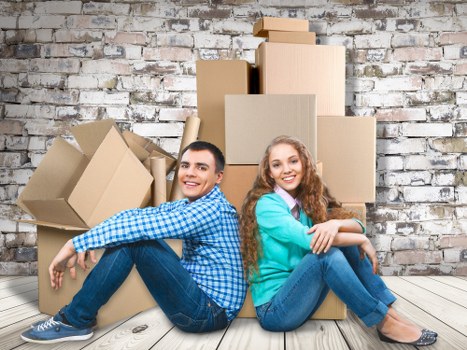 Movers using trolleys and careful handling for secure transport