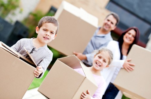 Professional house movers helping with a flat move in Woking