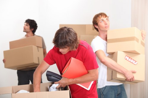 Boxes and household items loaded for transport in Woking