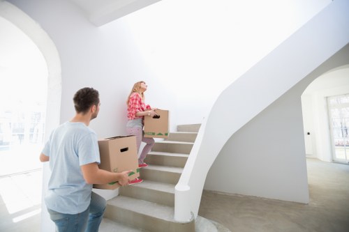 Furniture and boxes being loaded by a local moving team in Woking