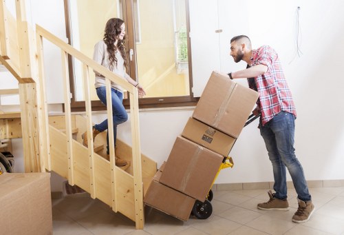 Preparing packed boxes for a local move in Woking