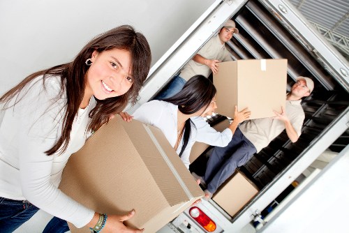 Careful handling of furniture during a house move in Woking