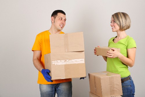 Removal van loading household items for a Woking move