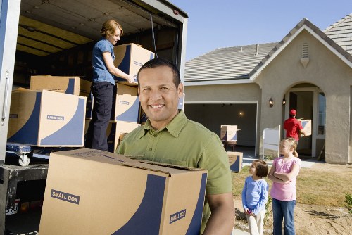 Packing and loading belongings for a local Woking removals job