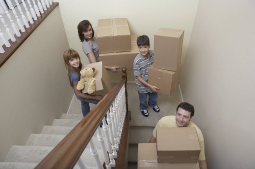 Careful loading of household items for a Woking removal job